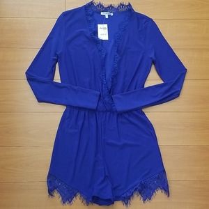 💙 Dark blue romper. New, never worn.